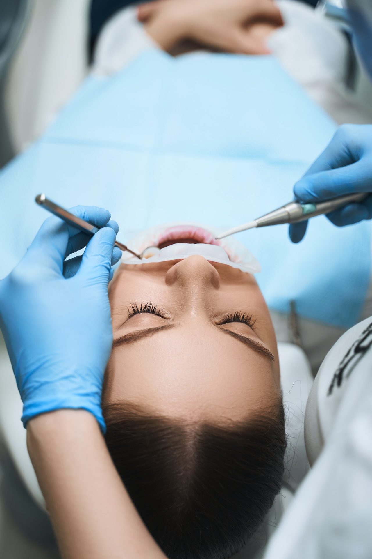 Caucasian woman in dental clinic stock photo